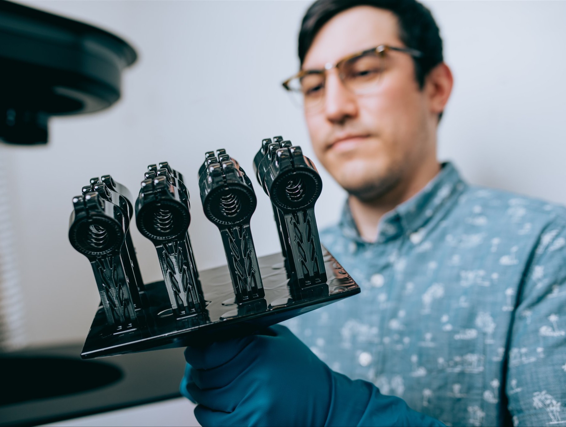Examine 3D printed parts from M2 Printer Examine 3D printed parts from M2 Printer