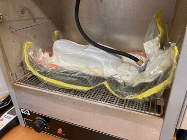 Part under vacuum and placed in an oven