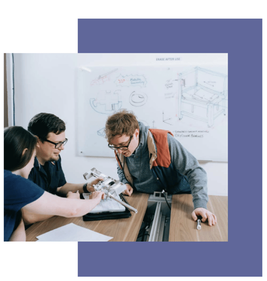 Image of designers and engineers looking at prototype Image of designers and engineers looking at prototype